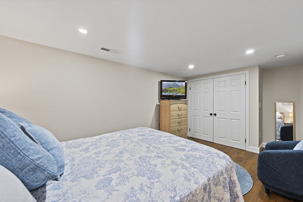 23 Bennett Lane Lancaster, MA 01523 - Photo 23 of 29 a spacious bedroom with a bed and furniture