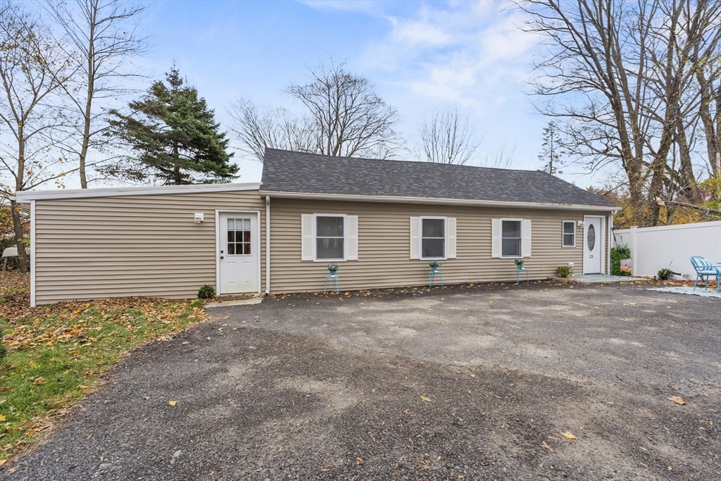 23 Bennett Lane Lancaster, MA 01523 - Photo 26 of 29 a view of a house with a yard