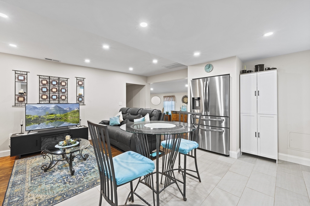 23 Bennett Lane Lancaster, MA 01523 - Photo 6 of 29 a view of a dining room with furniture
