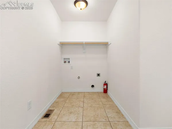 a view of a house with a street