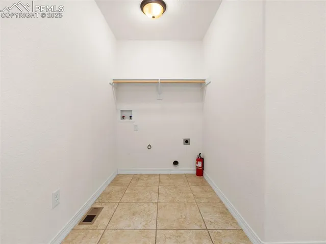 a view of a house with a street