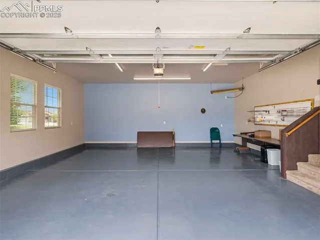 a view of house with backyard