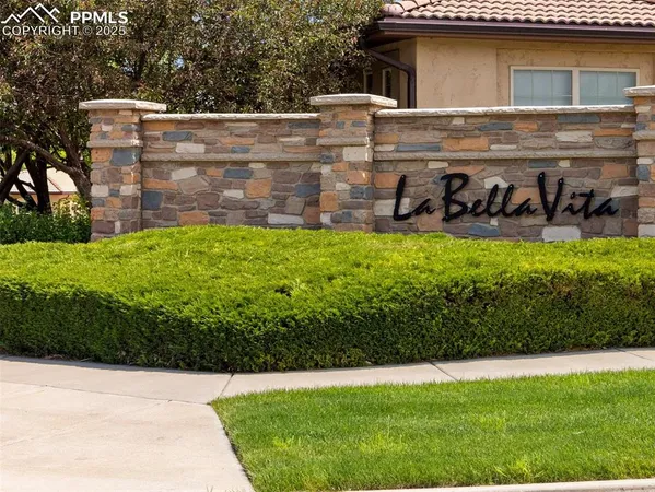 a view of a road with a building in the background