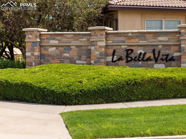 a view of a road with a building in the background