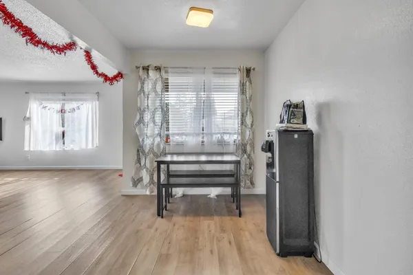 a workspace with furniture and a window