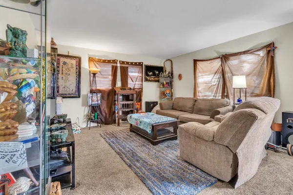 a living room with furniture and a couch