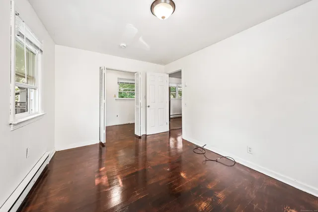 a view of livingroom with hardwood floor and window
