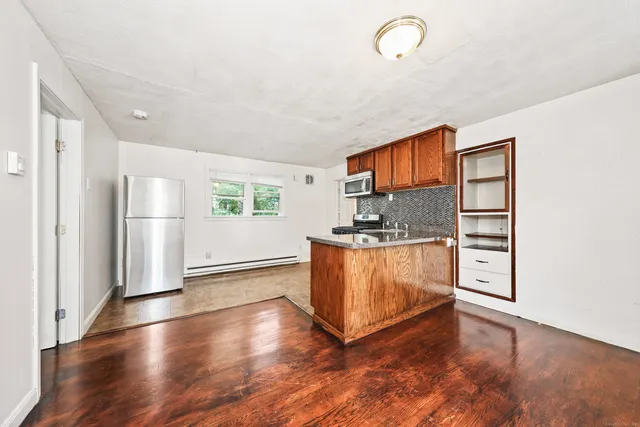 a view of kitchen and utility room
