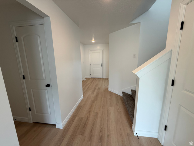 1513 South Deerbrook Road, Unit 256 Santaquin, UT 84655 - Photo 5 of 7 Entryway featuring wood-finish flooring and bright white walls