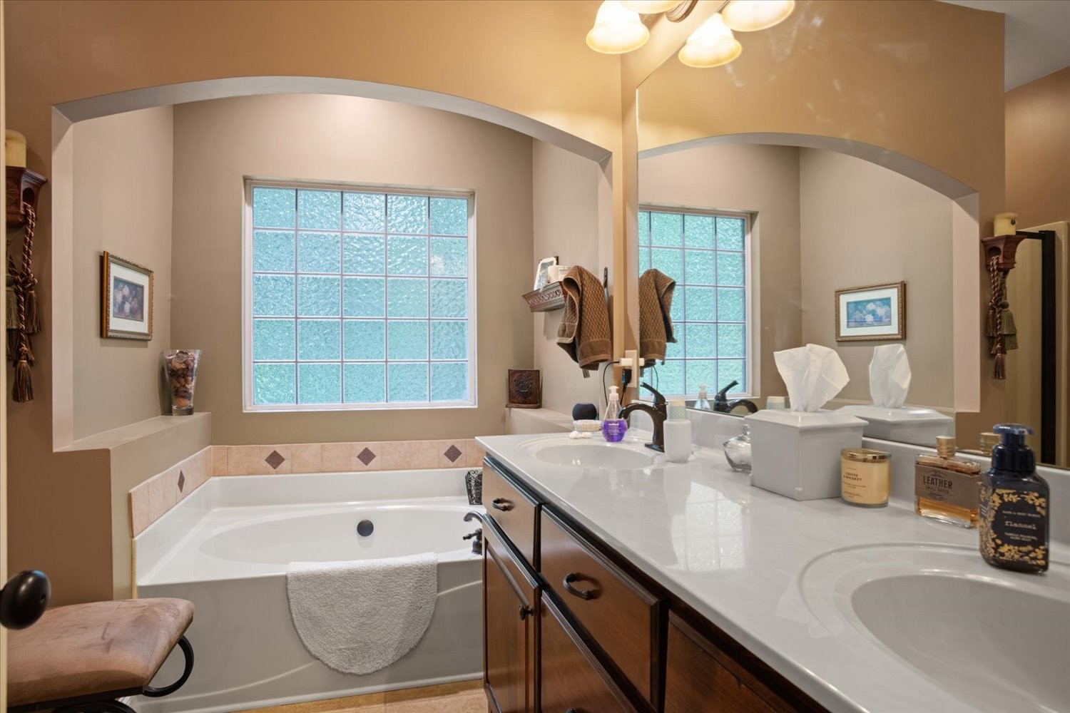 1765 Sugar Ridge Road Spring Hill, TN 37174 - Photo 24 of 44 a bathroom with a tub sink and mirror