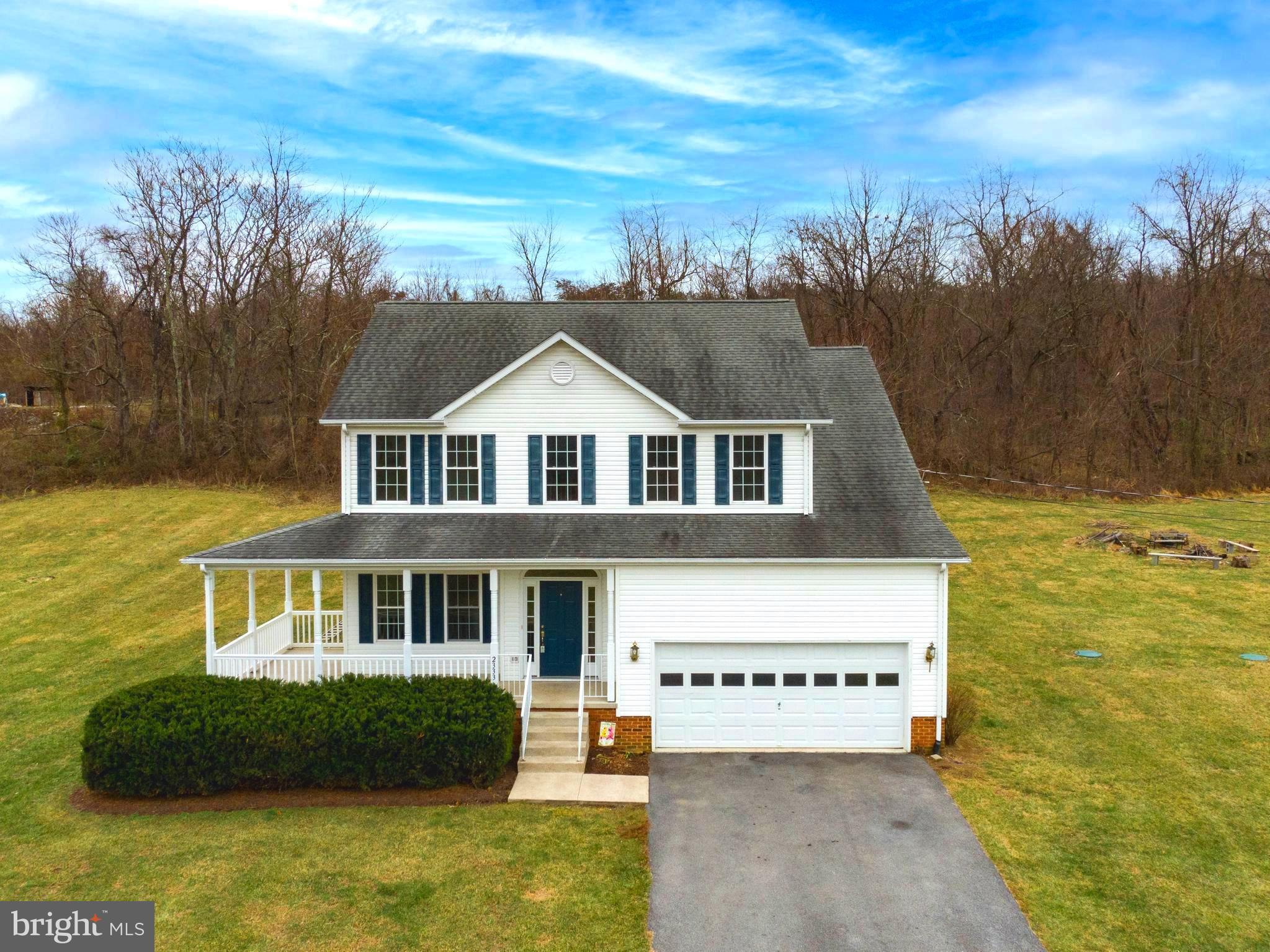 4-bed colonial on 2 acres with wraparound porch