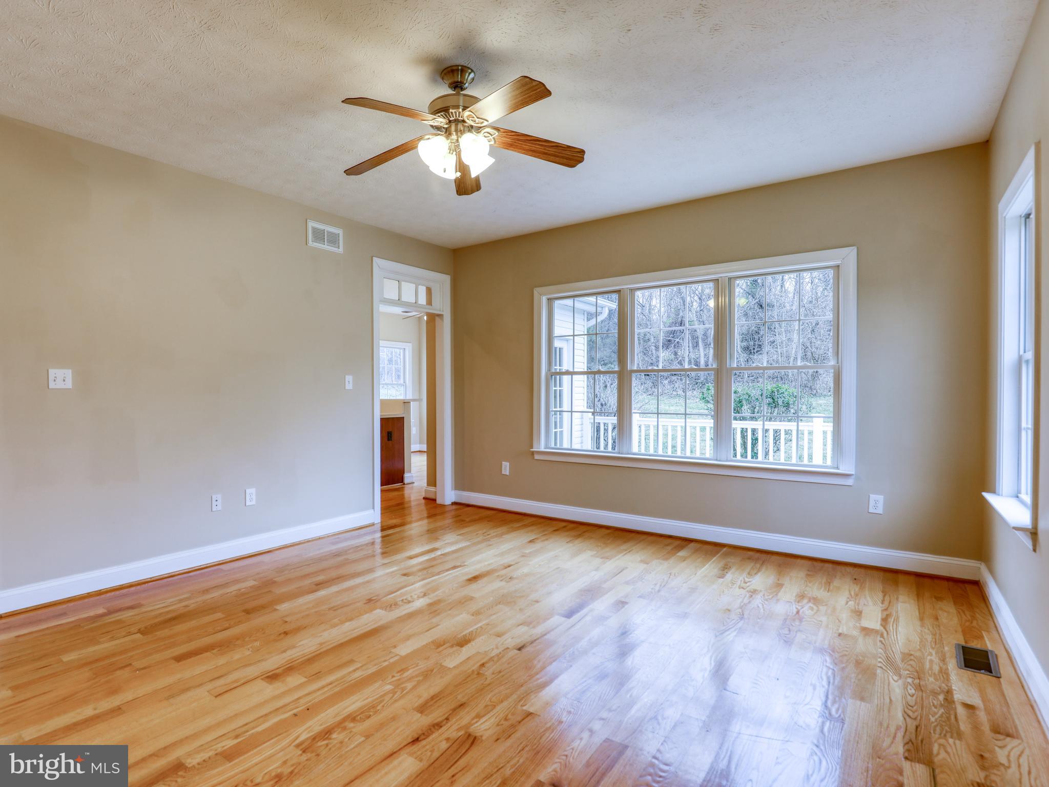 2333 Dominion Road Gerrardstown, WV 25420 - Photo 15 of 36 Family room has fresh paint and hardwood floors