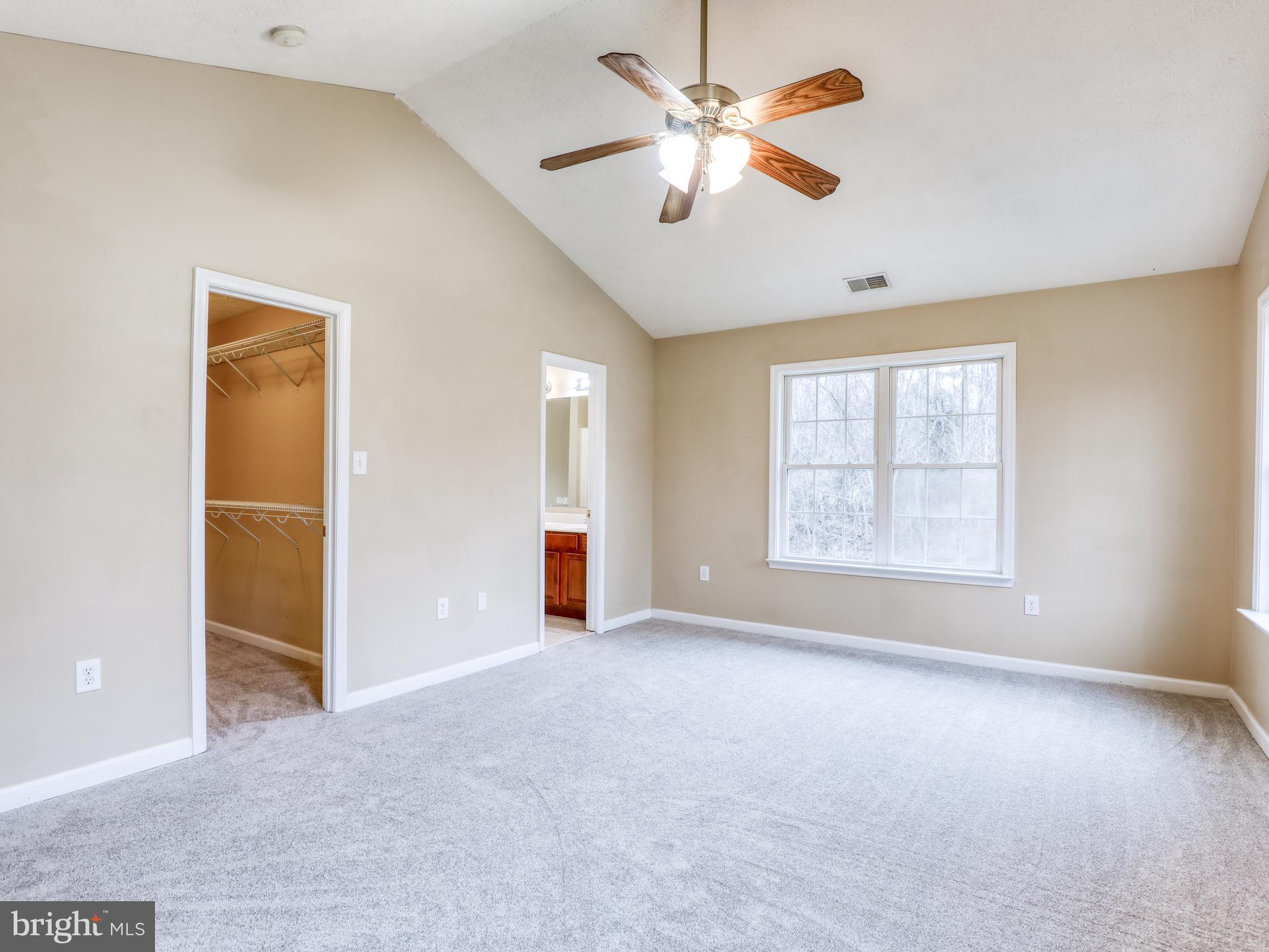 2333 Dominion Road Gerrardstown, WV 25420 - Photo 19 of 36 Primary bedroom with vaulted ceiling & new carpet