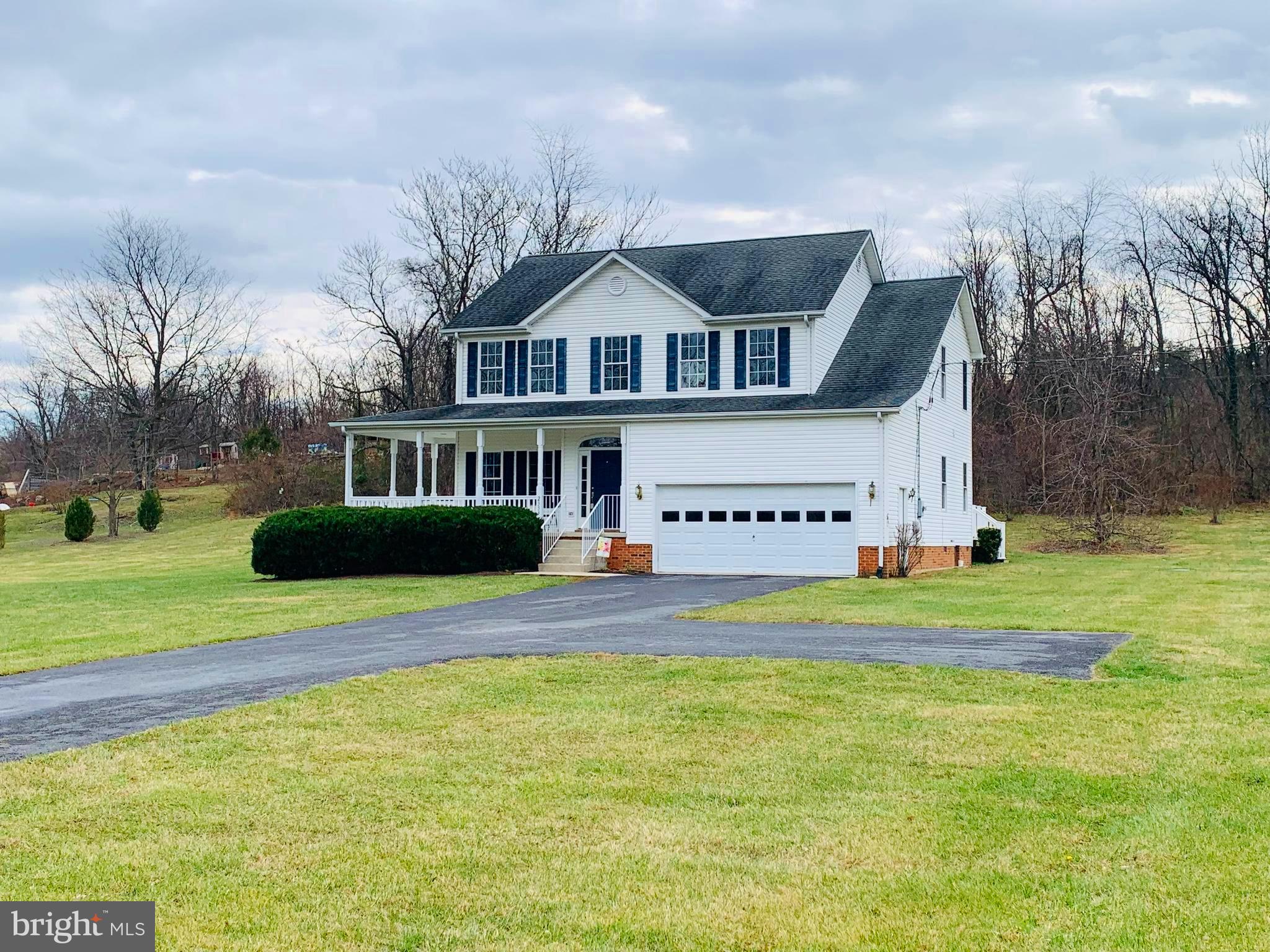 4-bed colonial on 2 acres with wraparound porch