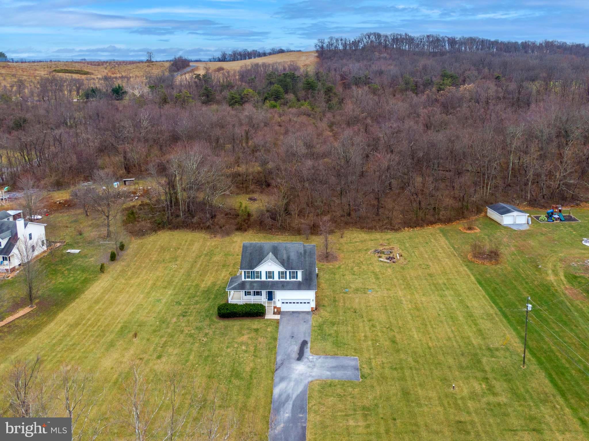4-bed colonial on 2 acres with wraparound porch