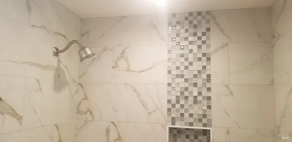 a bathroom with a toilet and a sink