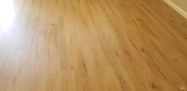 a kitchen with a refrigerator sink stove and cabinets