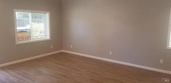 a view of a window and an entryway