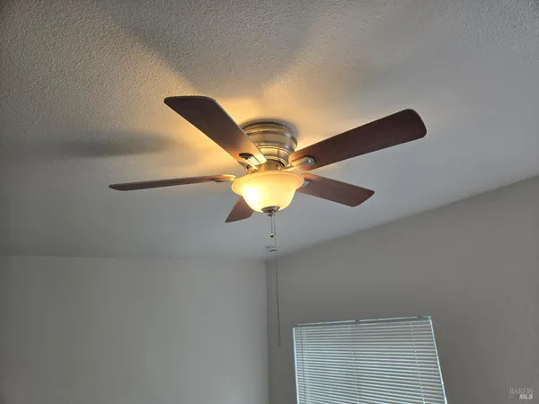 a kitchen with cabinets and appliances