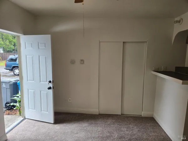 a bathroom with a sink toilet and mirror