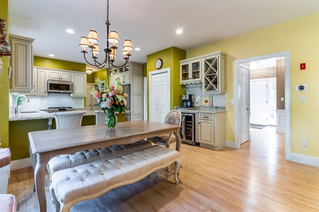 139 Shade Street Lexington, MA 02421 - Photo 11 of 42 a view of a kitchen and dining room