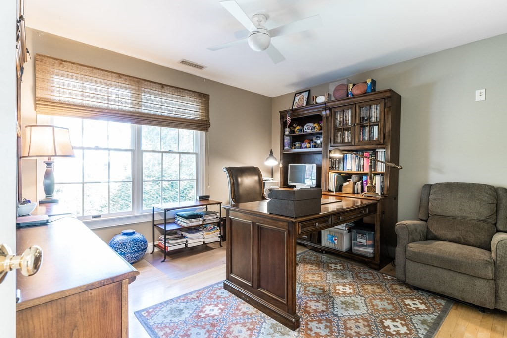 139 Shade Street Lexington, MA 02421 - Photo 23 of 42 a view of a livingroom with workspace and a couch