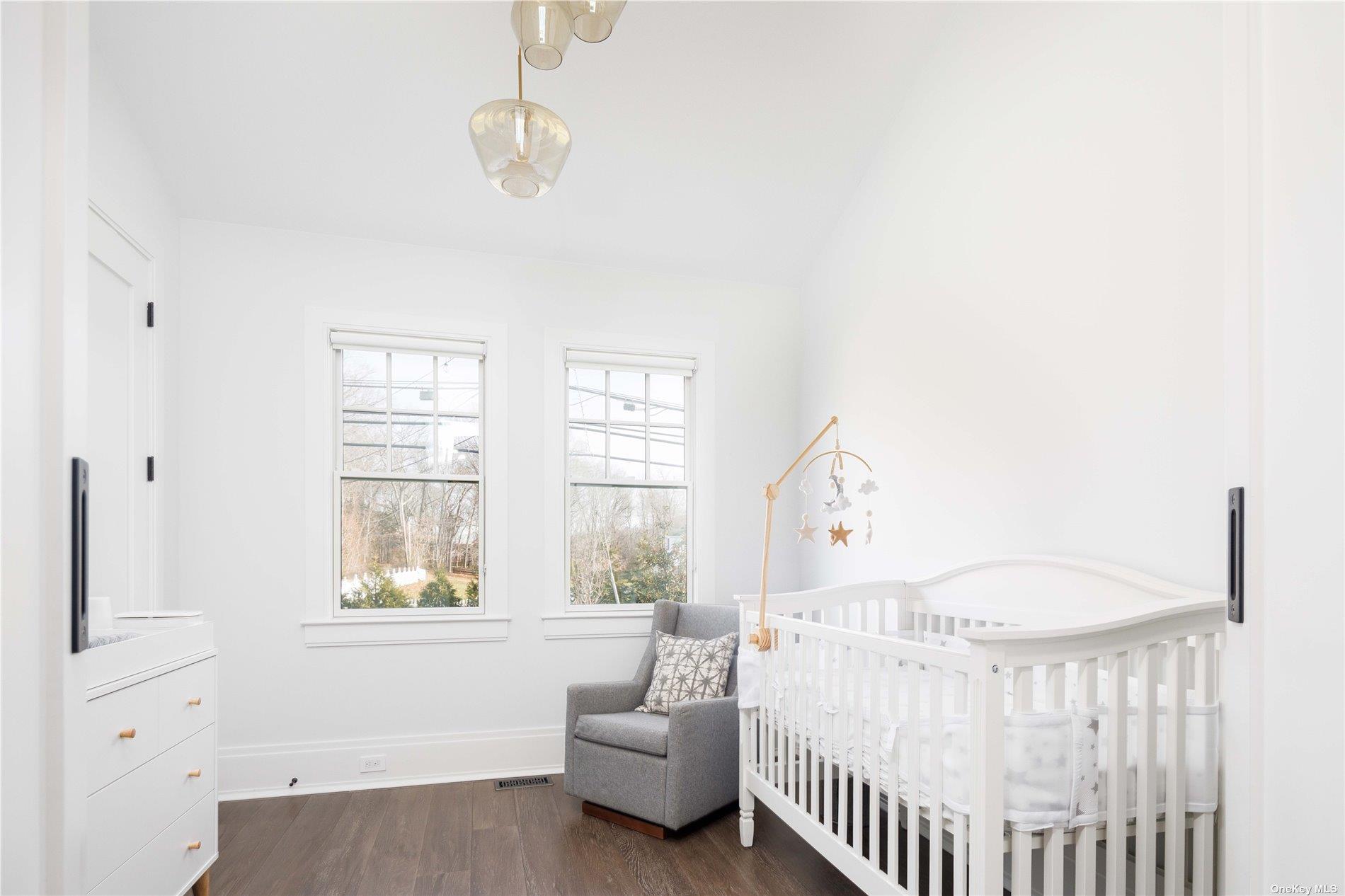 2415 Cox Neck Road Mattituck, NY 11952 - Photo 10 of 10 a bedroom with furniture and a window