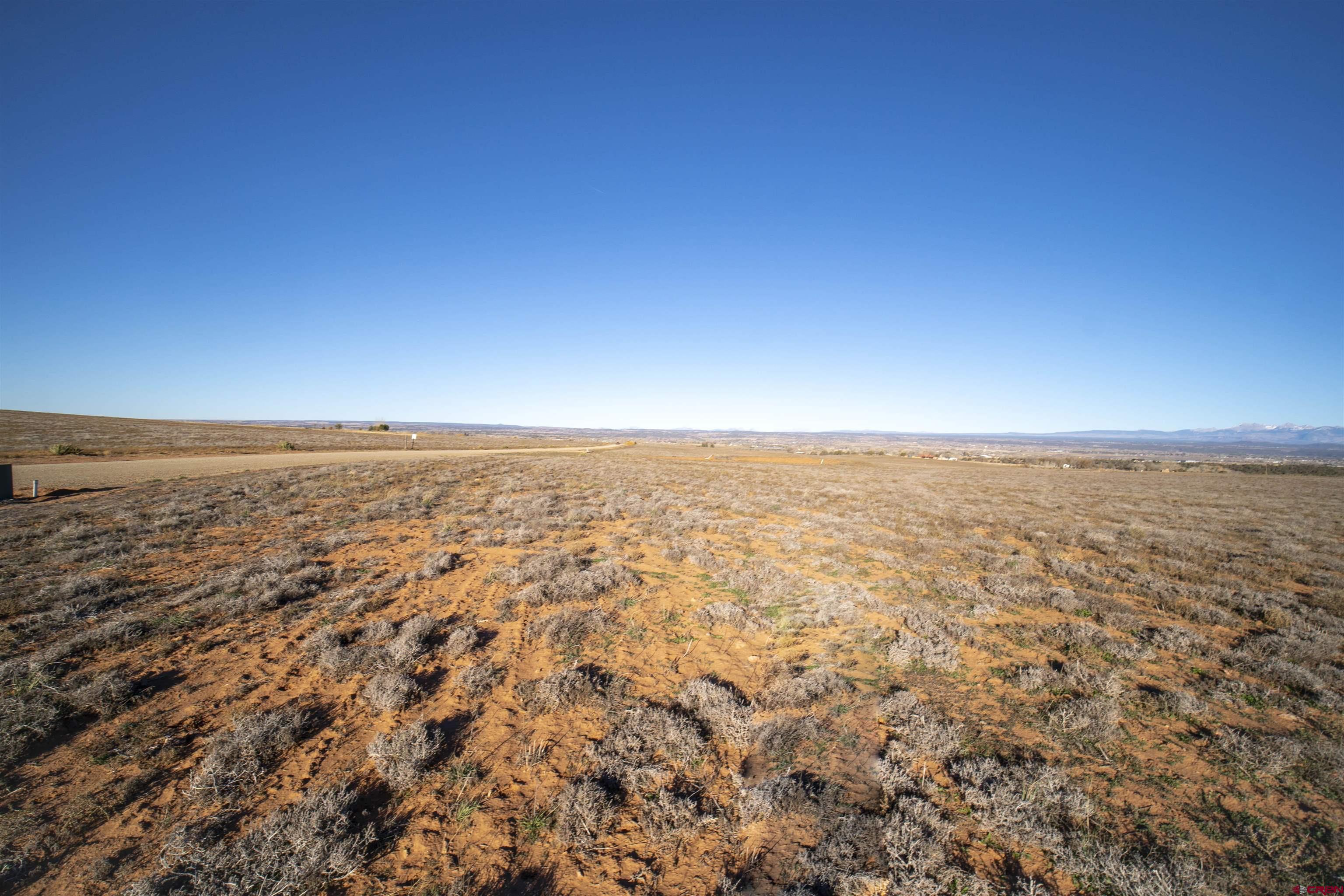 10266 Road 22.6 Cortez, CO 81321 - Photo 21 of 37 an aerial view of residential houses with ocean view