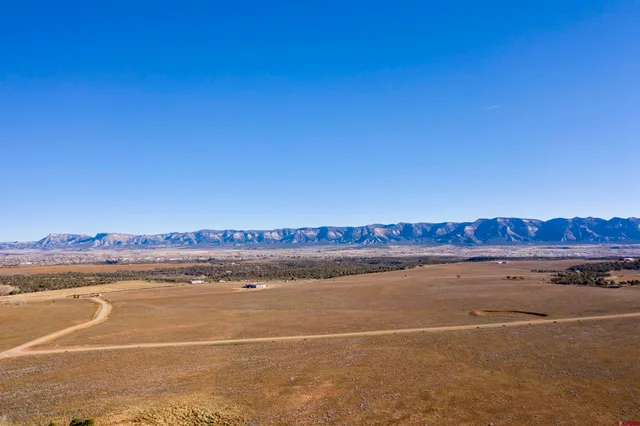 a view of an ocean and a mountain