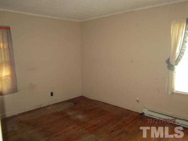 2250 Bobbitt Road Kittrell, NC 27544 - Photo 11 of 15 an empty room with a window