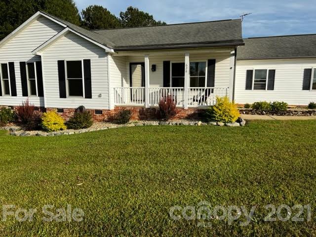 628 Champion Ferry Road Gaffney, SC 29341 - Photo 1 of 26 a front view of a house with a yard