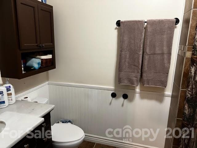 628 Champion Ferry Road Gaffney, SC 29341 - Photo 15 of 26 a bathroom with a sink toilet and vanity