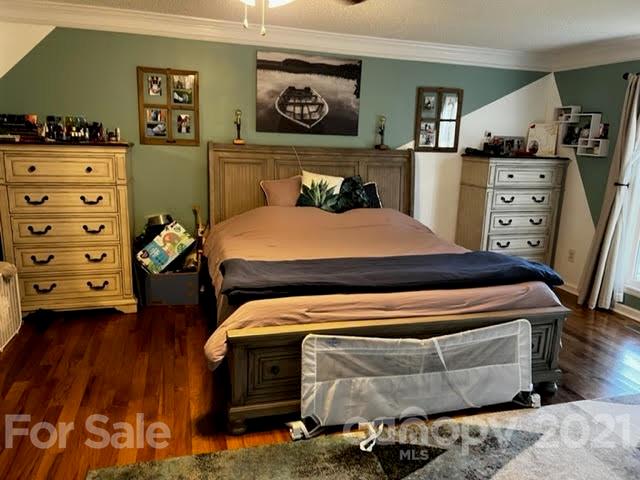 628 Champion Ferry Road Gaffney, SC 29341 - Photo 18 of 26 a bedroom with a bed and furniture