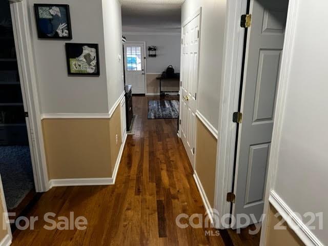 628 Champion Ferry Road Gaffney, SC 29341 - Photo 21 of 26 a view of a hallway with wooden floor and stairs