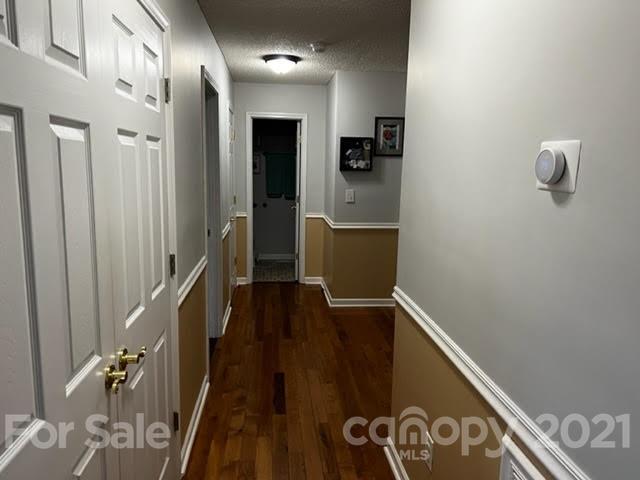 628 Champion Ferry Road Gaffney, SC 29341 - Photo 7 of 26 a view of hallway with wooden floor