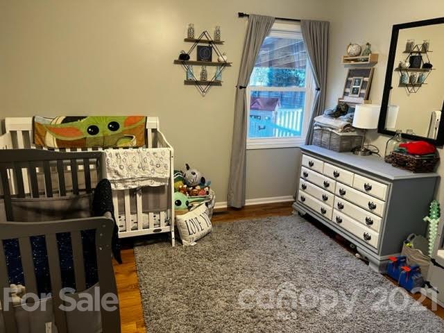 628 Champion Ferry Road Gaffney, SC 29341 - Photo 9 of 26 a bedroom with furniture and a window