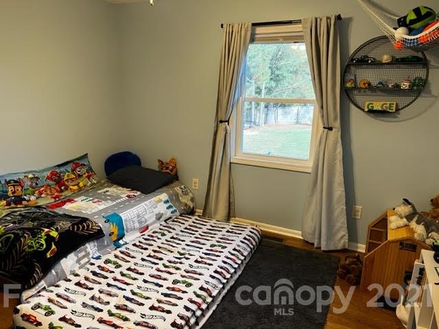628 Champion Ferry Road Gaffney, SC 29341 - Photo 10 of 26 a bedroom with a bed and a window