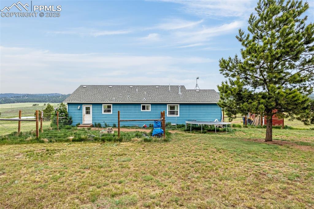 406 High Pasture Road Florissant, CO 80816 - Photo 17 of 28 a house view with a sitting space and garden