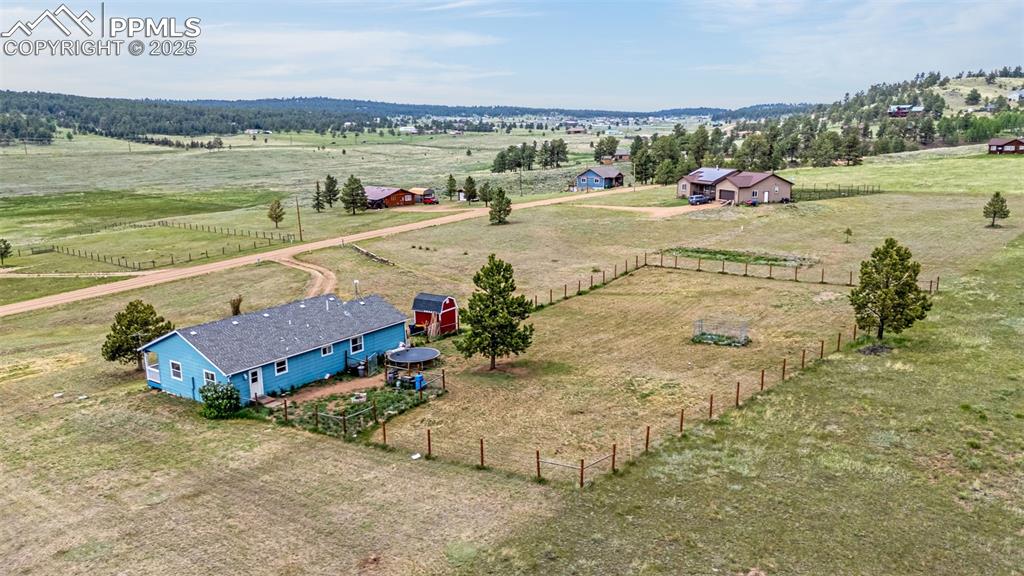 406 High Pasture Road Florissant, CO 80816 - Photo 23 of 28 a view of a city and an ocean beach
