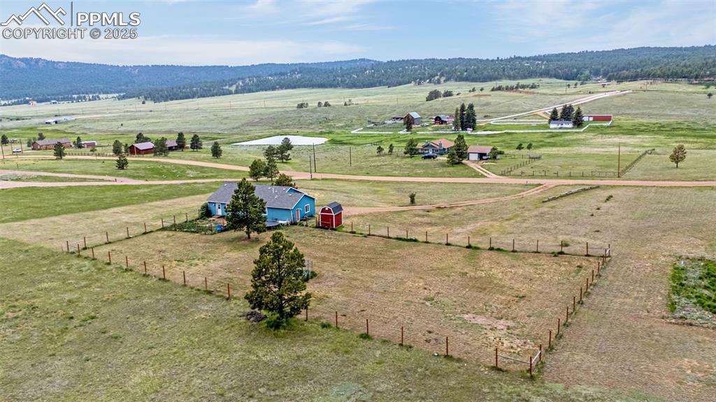 406 High Pasture Road Florissant, CO 80816 - Photo 24 of 28 a view of a field with an ocean