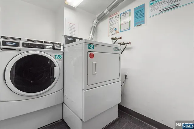 a view of a swimming pool with a lounge chair