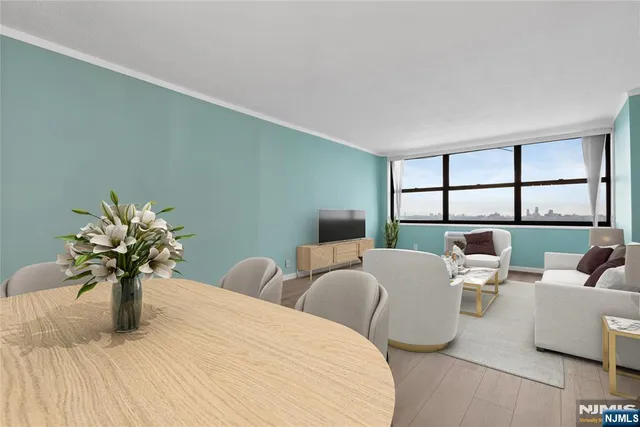 a living room with furniture and a table