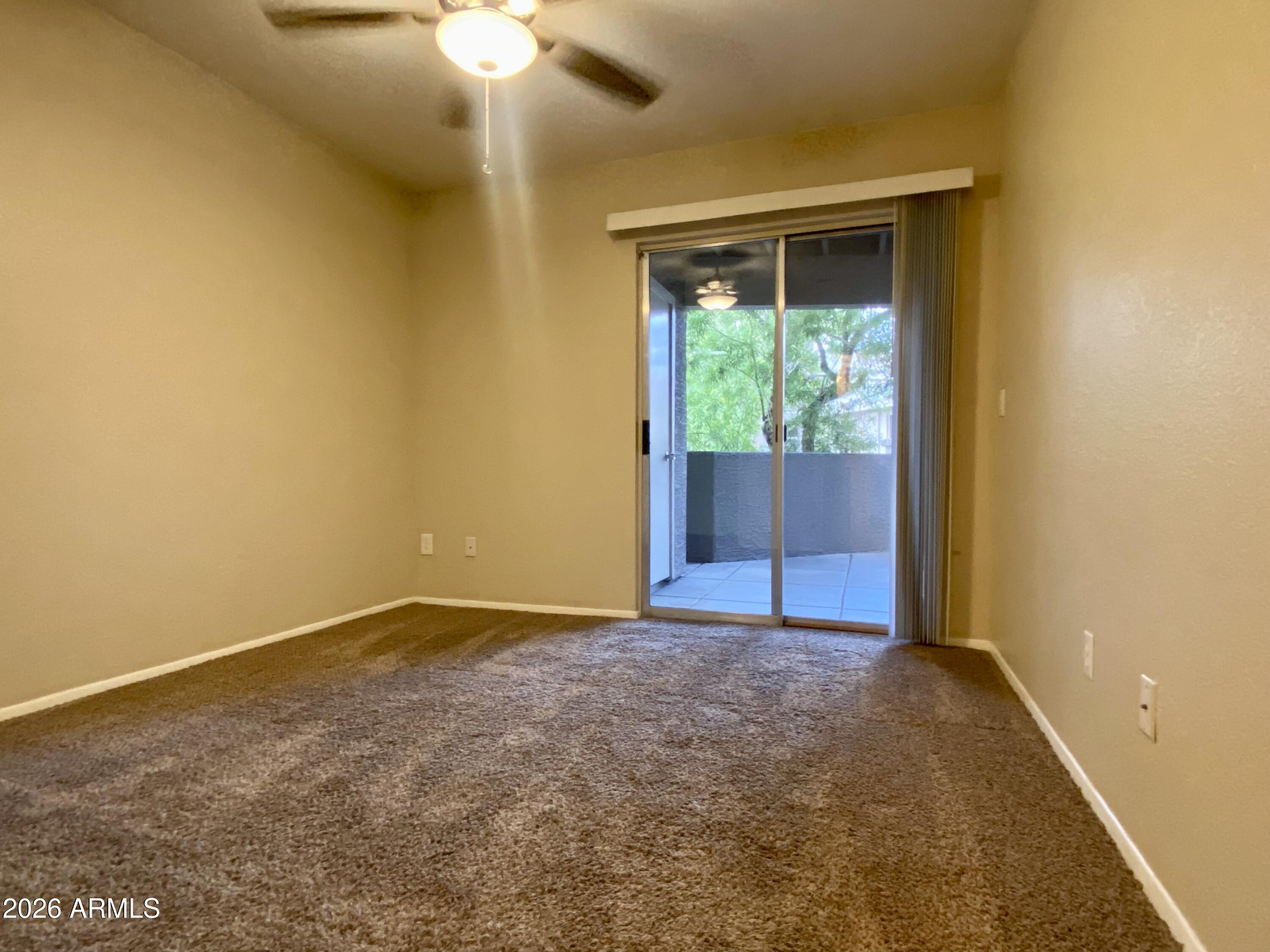 1720 East Thunderbird Road, Unit 1100 Phoenix, AZ 85022 - Photo 14 of 34 a view of an empty room with a window