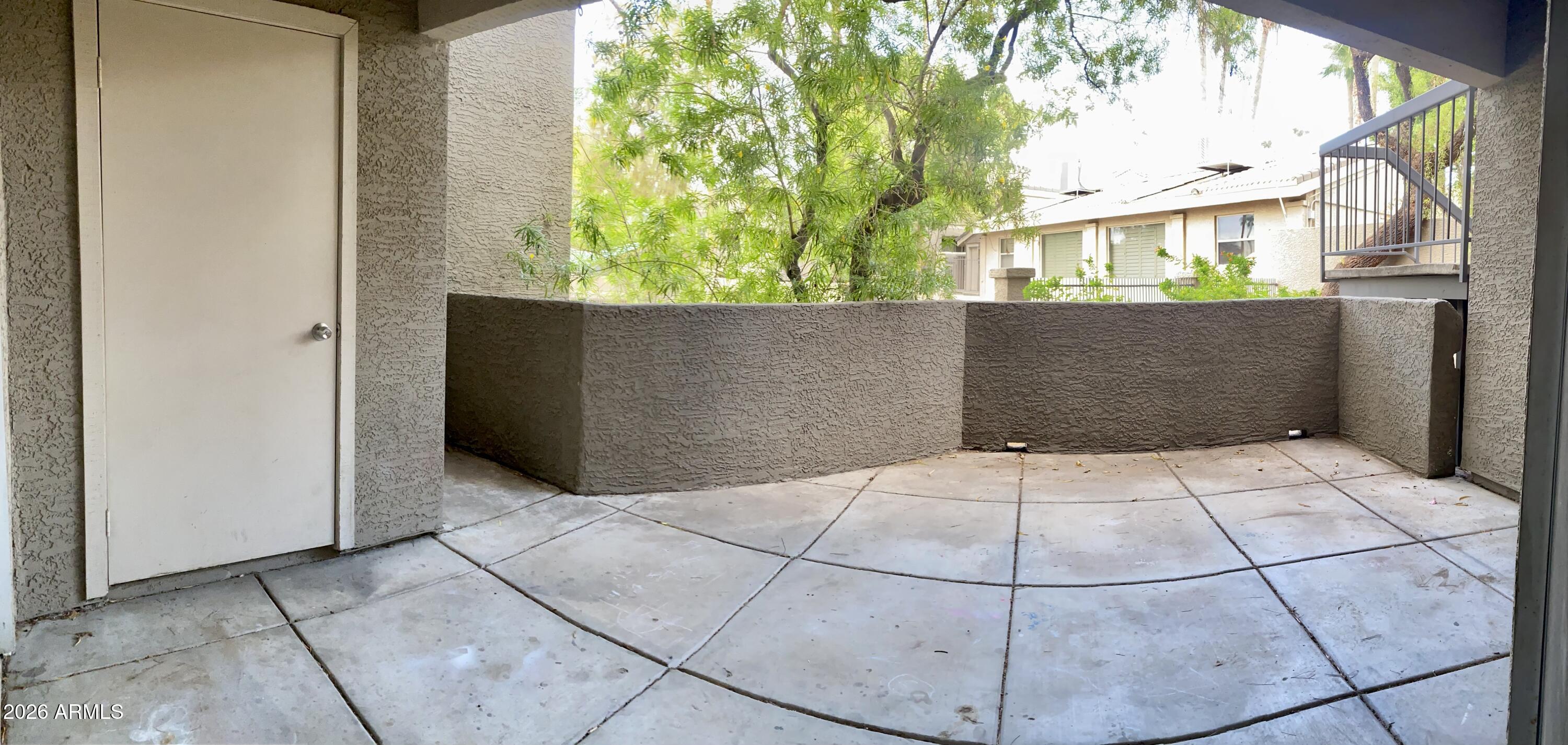 1720 East Thunderbird Road, Unit 1100 Phoenix, AZ 85022 - Photo 17 of 34 a backyard of a house with lots of green space