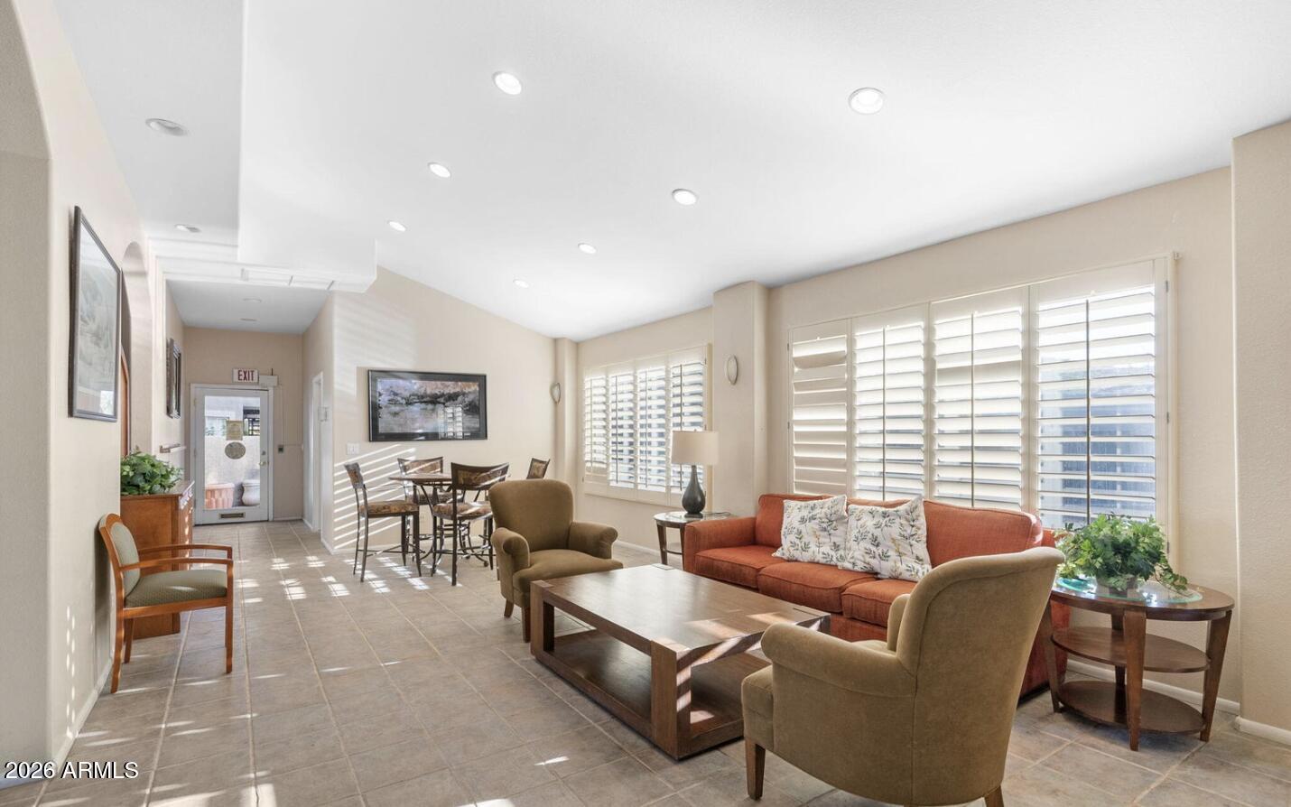 1720 East Thunderbird Road, Unit 1100 Phoenix, AZ 85022 - Photo 25 of 34 a living room with furniture and a large window