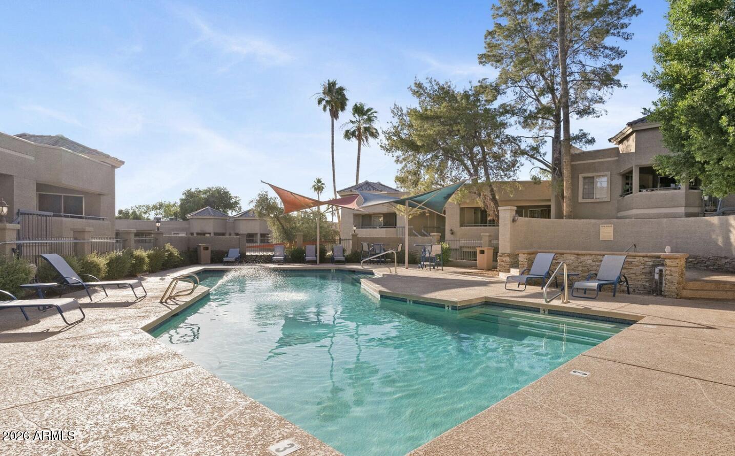 1720 East Thunderbird Road, Unit 1100 Phoenix, AZ 85022 - Photo 30 of 34 a view of a house with swimming pool