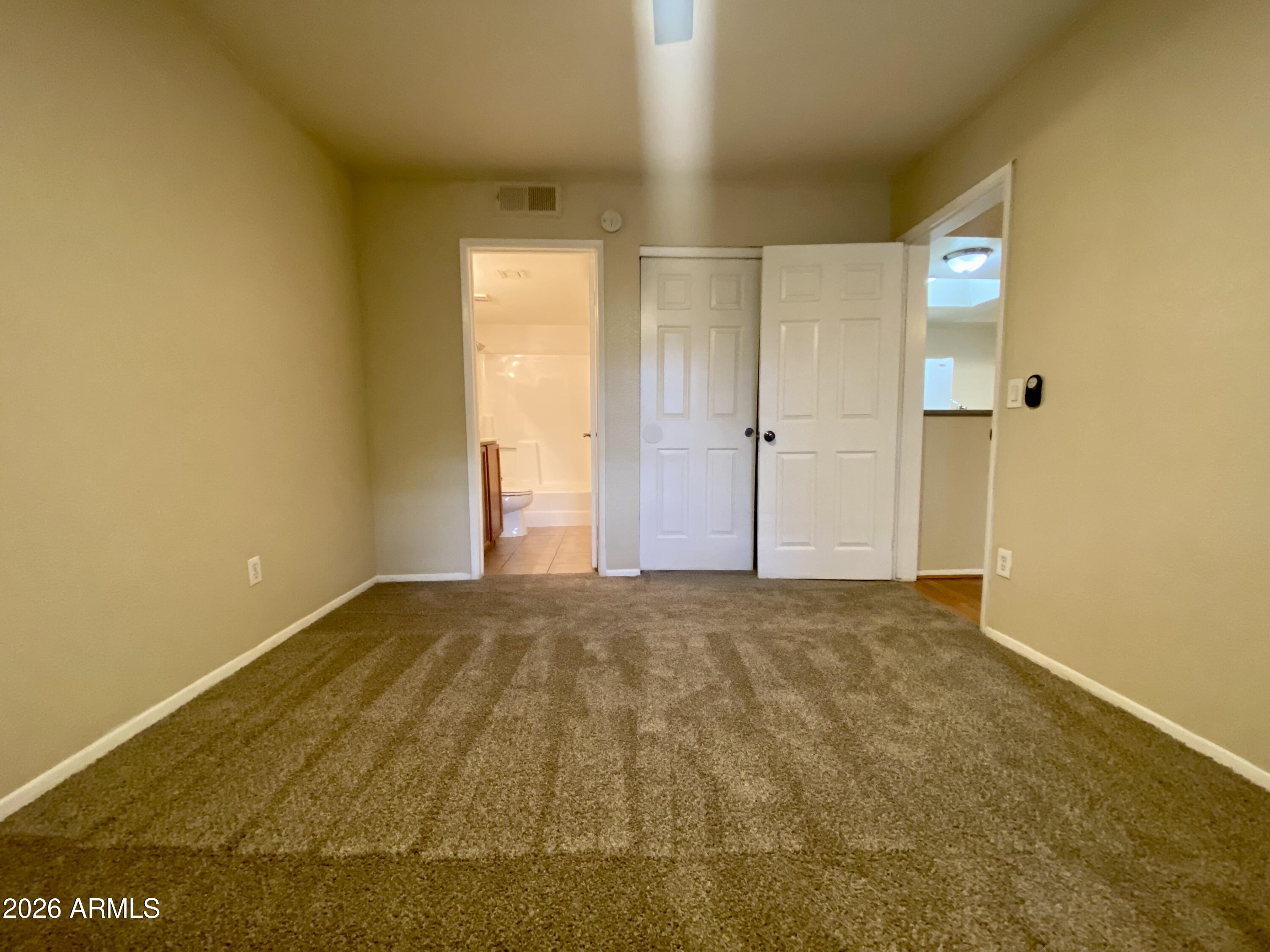 1720 East Thunderbird Road, Unit 1100 Phoenix, AZ 85022 - Photo 8 of 34 a view of an empty room and window