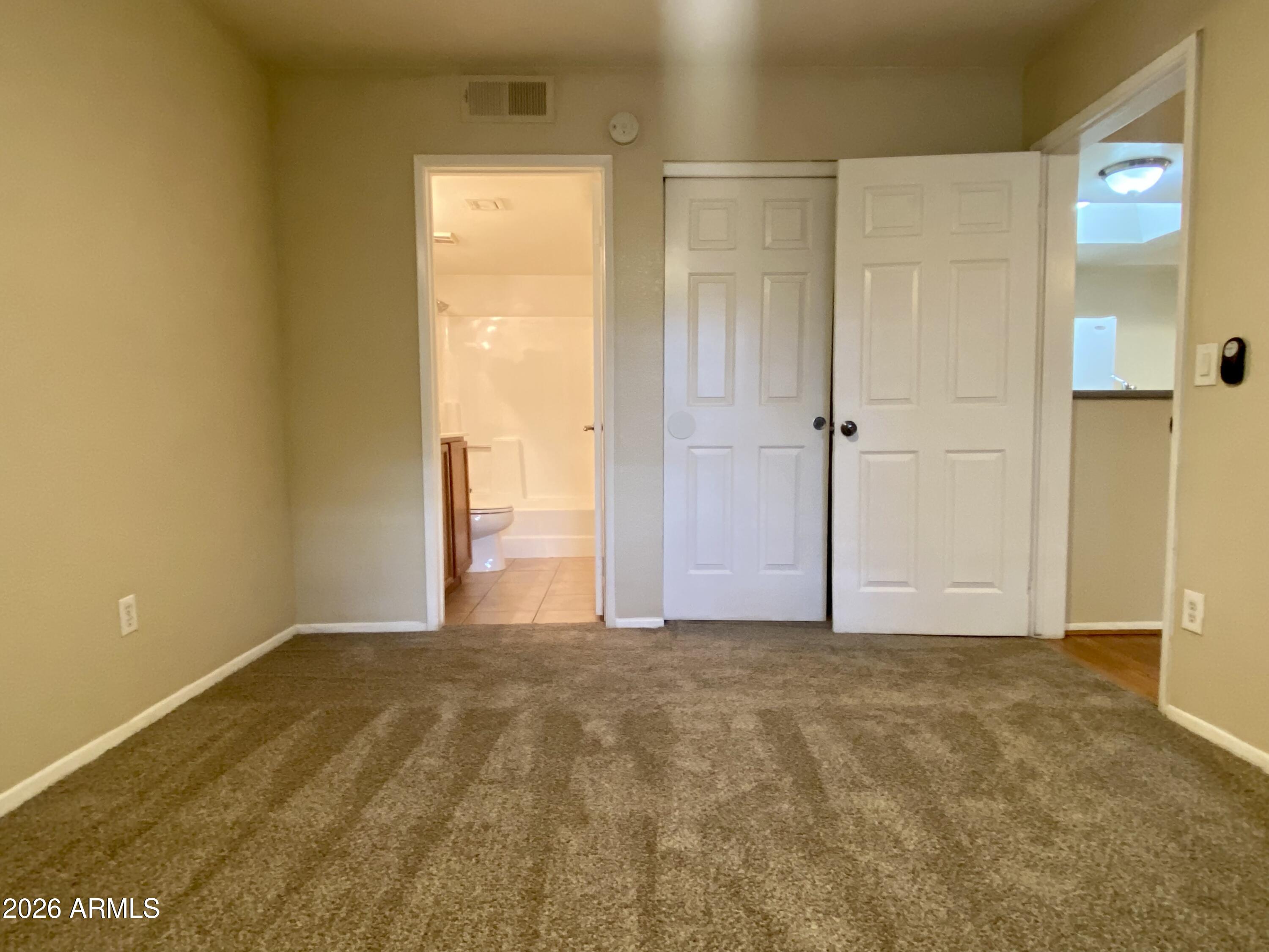 1720 East Thunderbird Road, Unit 1100 Phoenix, AZ 85022 - Photo 9 of 34 a view of an empty room