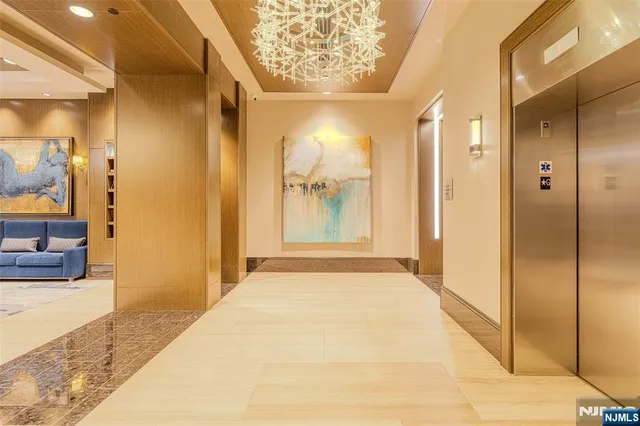 a living room with fireplace furniture and a flat screen tv