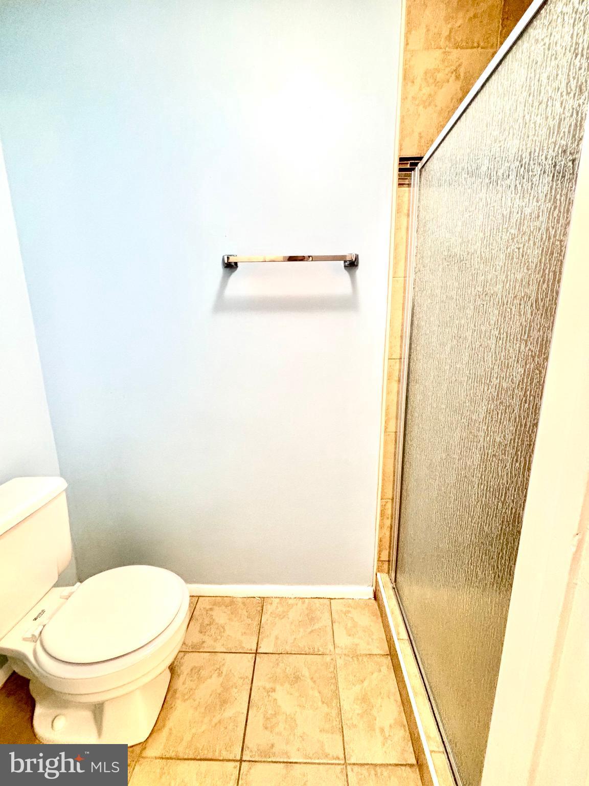 6226 Hillside Road Springfield, VA 22152 - Photo 18 of 37 a bathroom with a toilet and a shower